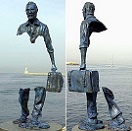 picture of a full-length bronze sculpture of a man with an empty space in the middle of his body between the top of the torso and the knees
